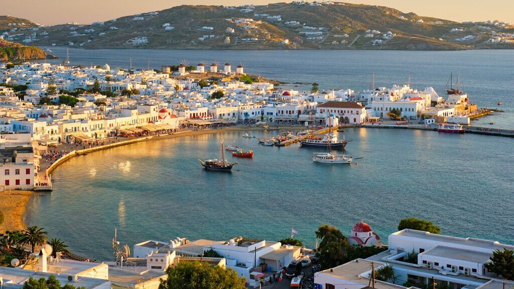 Mykonos island port with boats at sunset, Greece