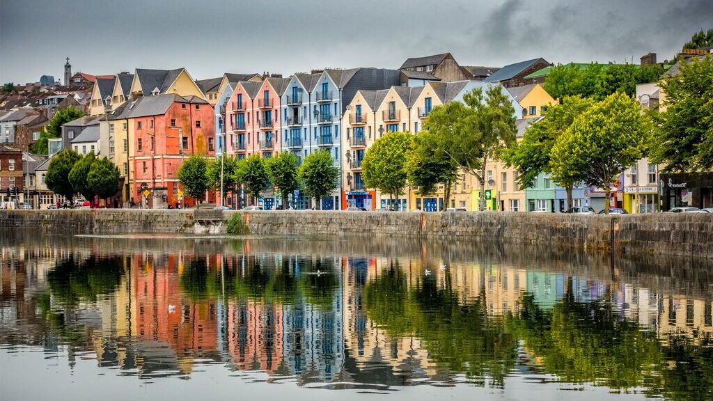 Colourful buildings across water in Cork, Ireland