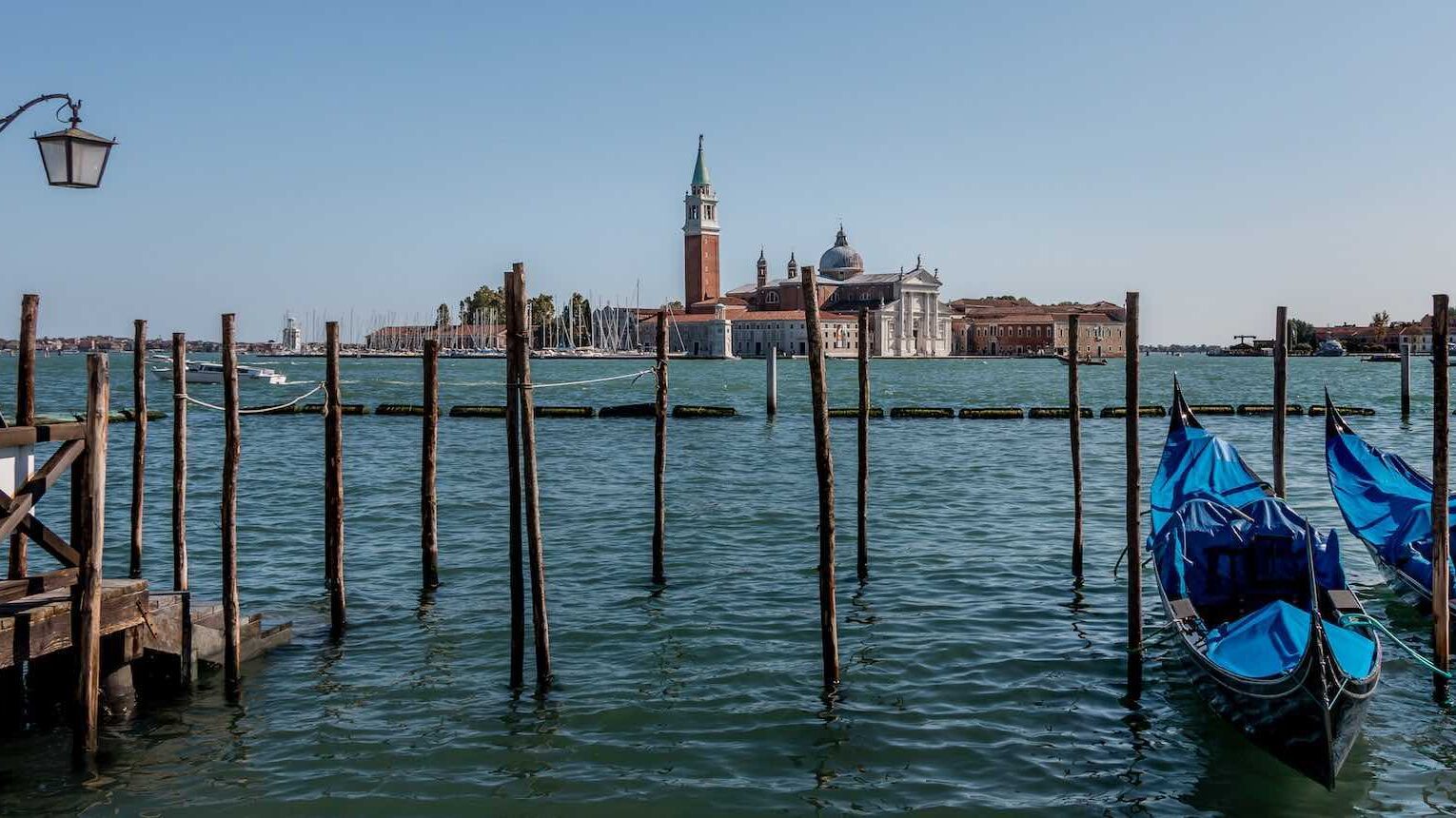 Poveglia Island with canoes in foreground, Italy