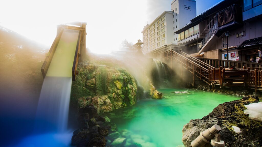 Japanese onsen hot springs with turquoise waters