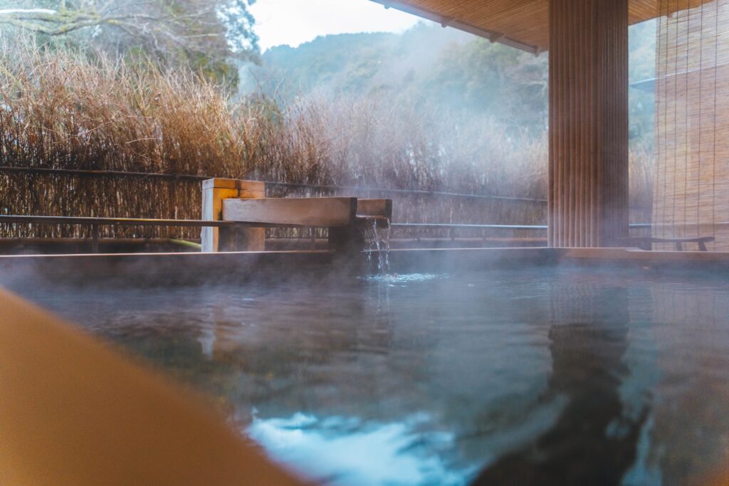 Steamy onsen hot springs. The water flows from a faucet.