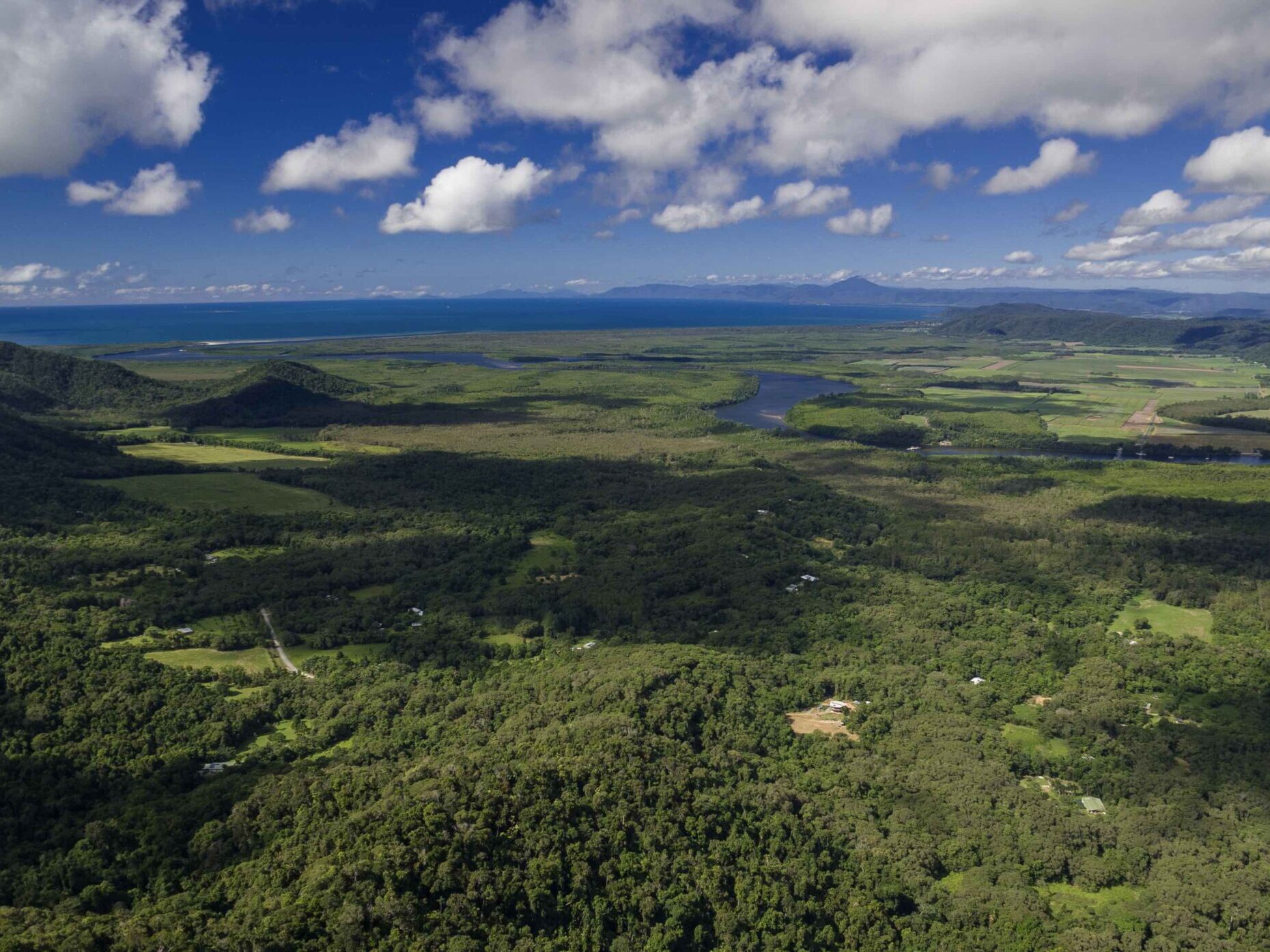 An aerial view of Daintree Rainforest.  Rainforest Rescue is one of our nature-based solutions that you can donate to and contribute to responsible travel