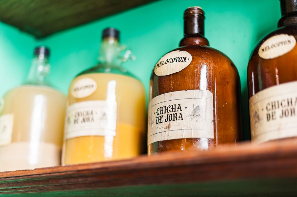 Chicha beer lined up in a local chicheria