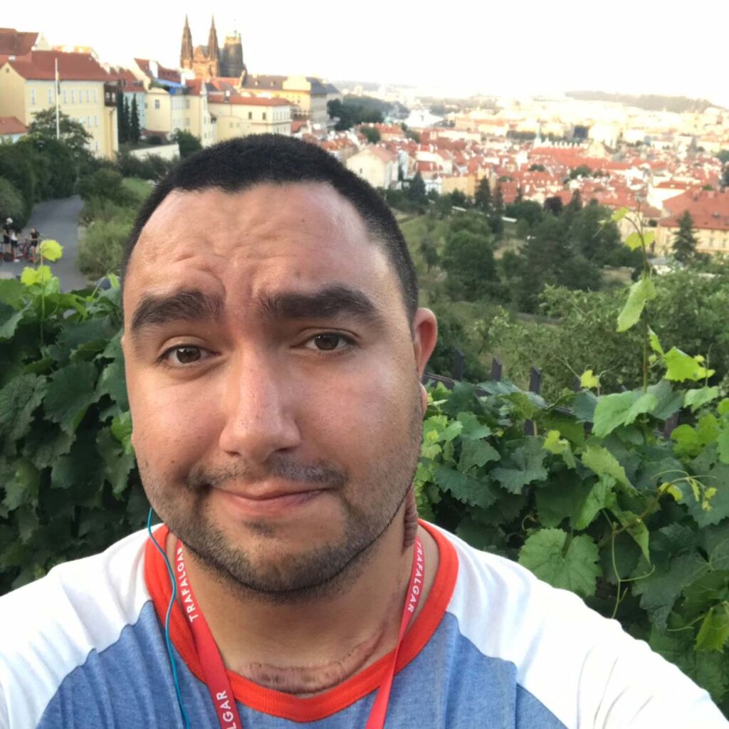 Trafalgar past guest David in front of a European town