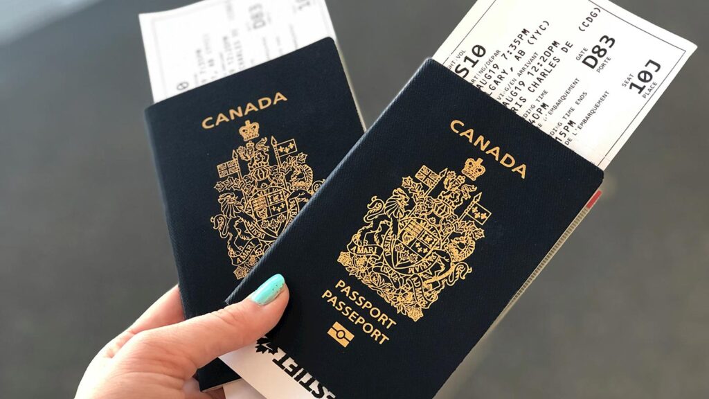Canadian passports with plane tickets