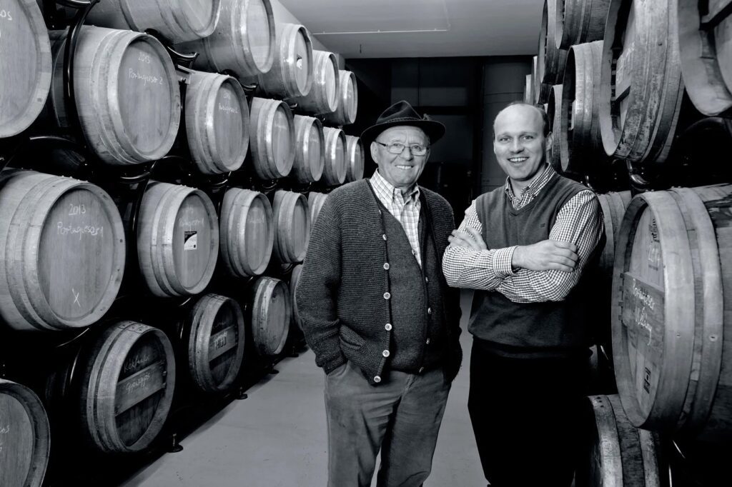 Local hosts from the Schieszl family in the cellar of their winery