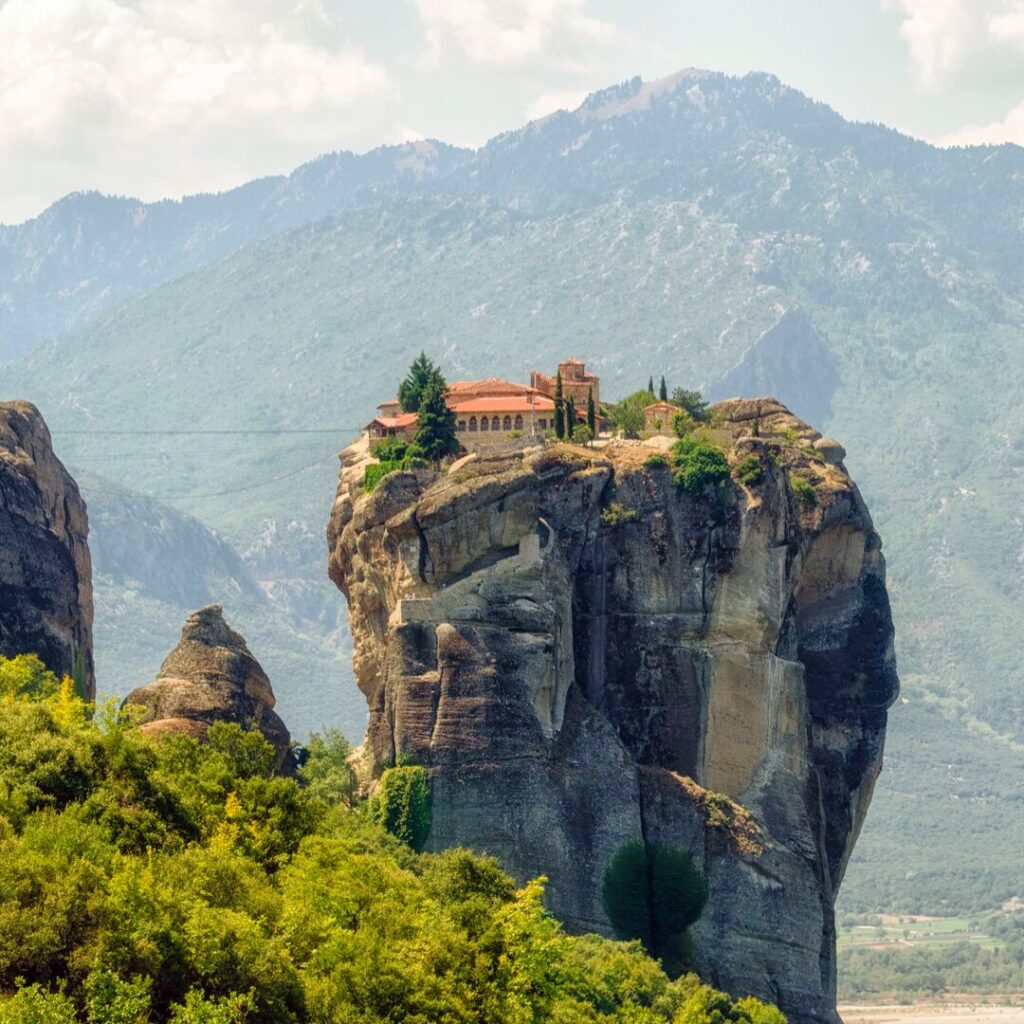 A monastery sits on a rock, this UNESCO-site is one of the most loved of Greece's sights.