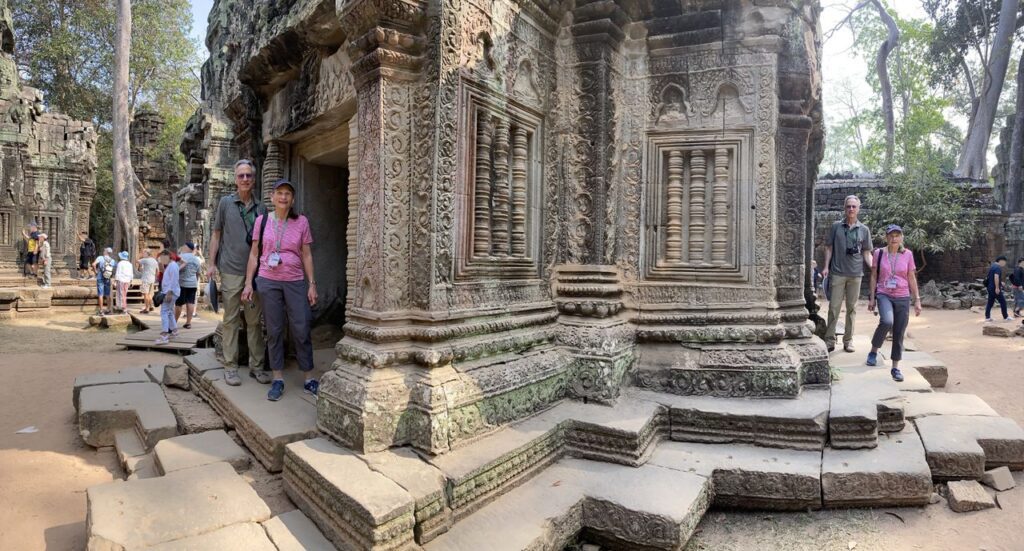 A couple posing at a temple in Asia