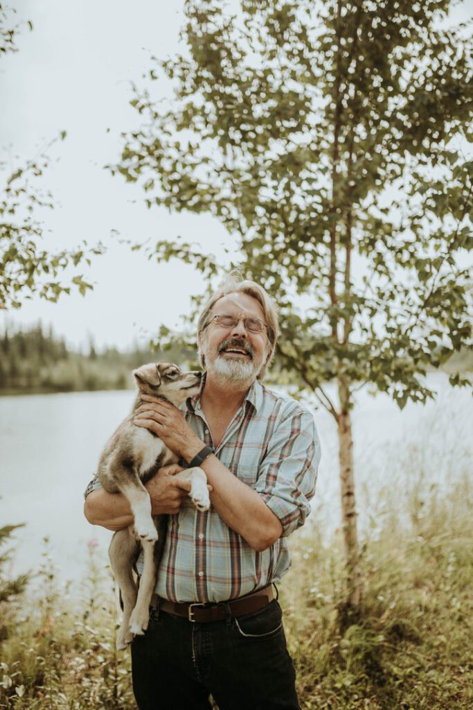 Dave Monson dog mushing expert with his dog