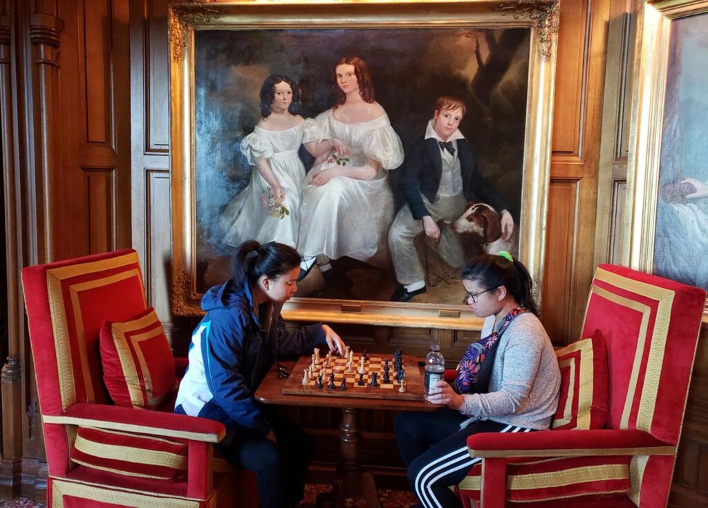 Past guest Louise H's daughters play chess on one of our Ireland tours