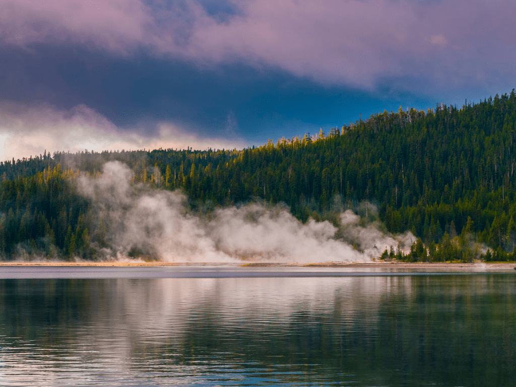 West Thumb Geyser Basin: smoking geysers next to a gorgeous lake and forest