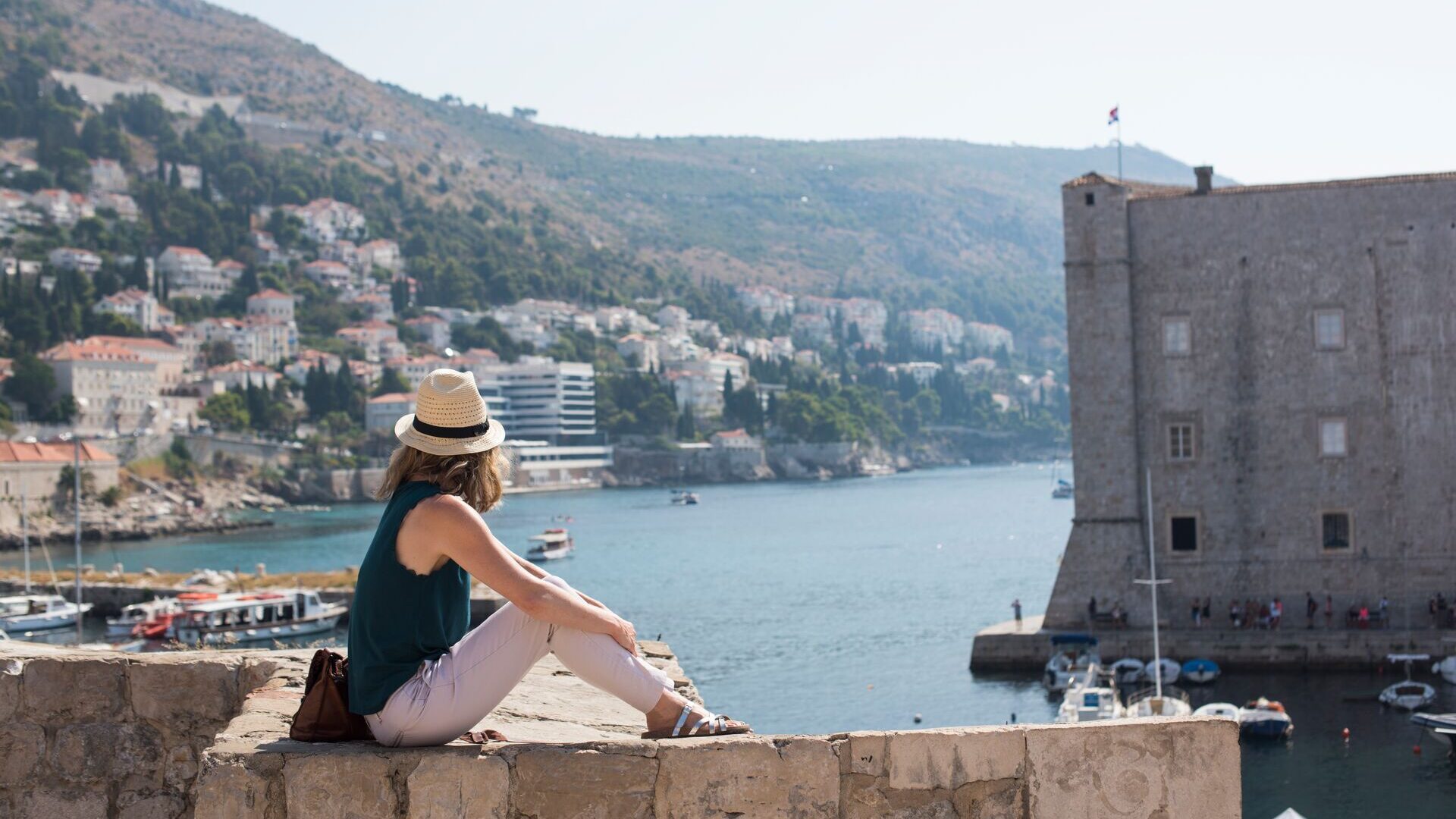 woman looking out to coast in croatia