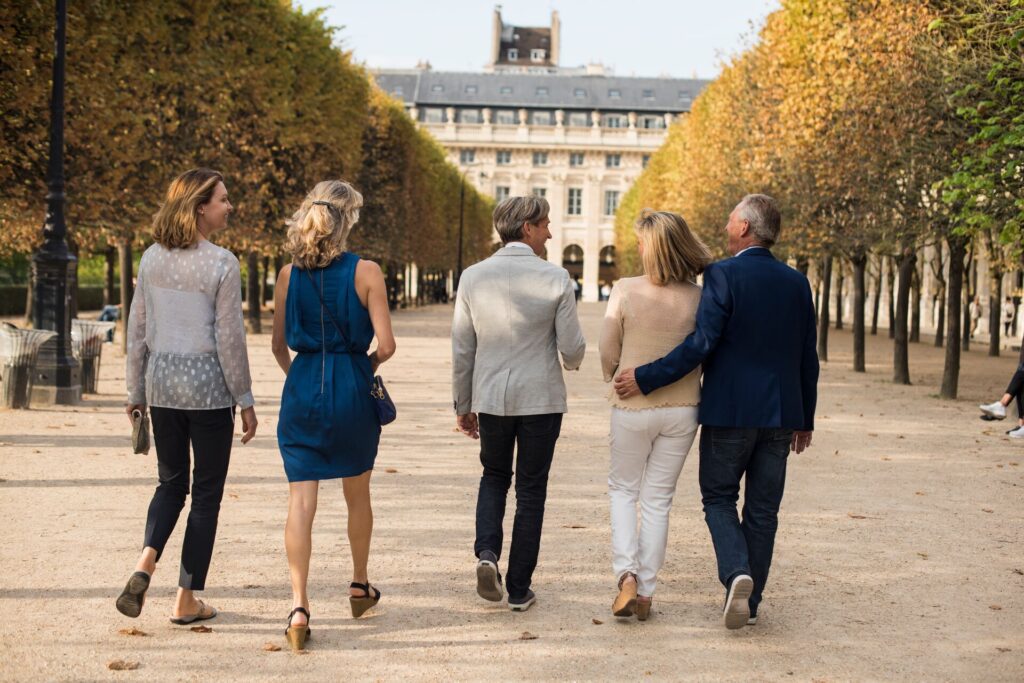 trafalgar travel director with guests in Paris