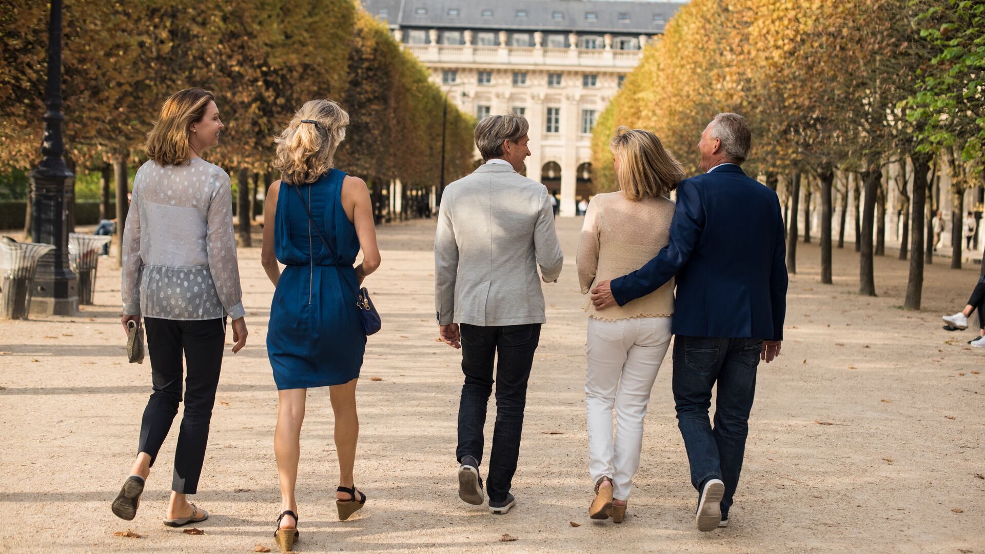 trafalgar travel director with guests in Paris