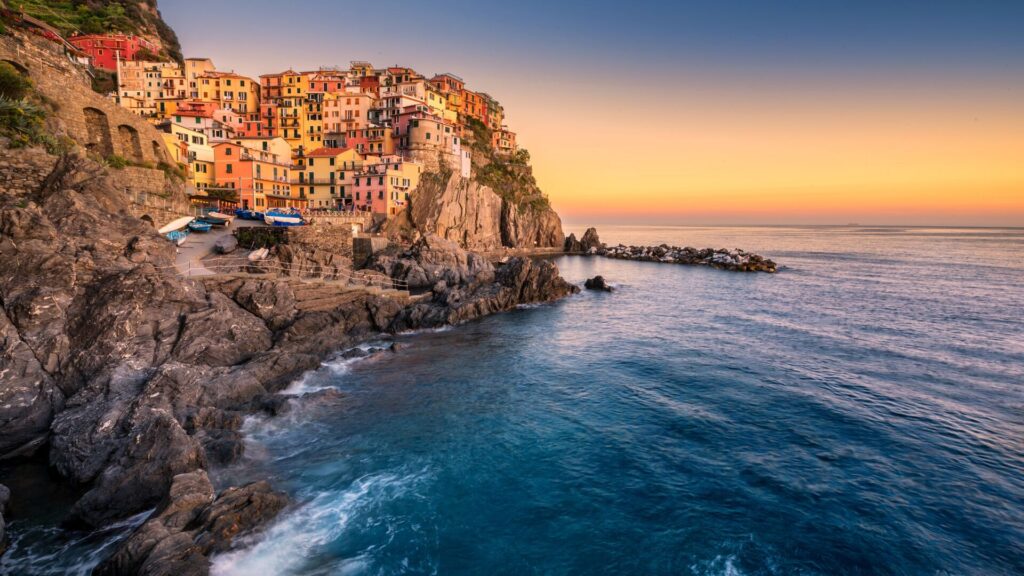 Cliff side town in Cinque Terre Italy, buildings together on the side.