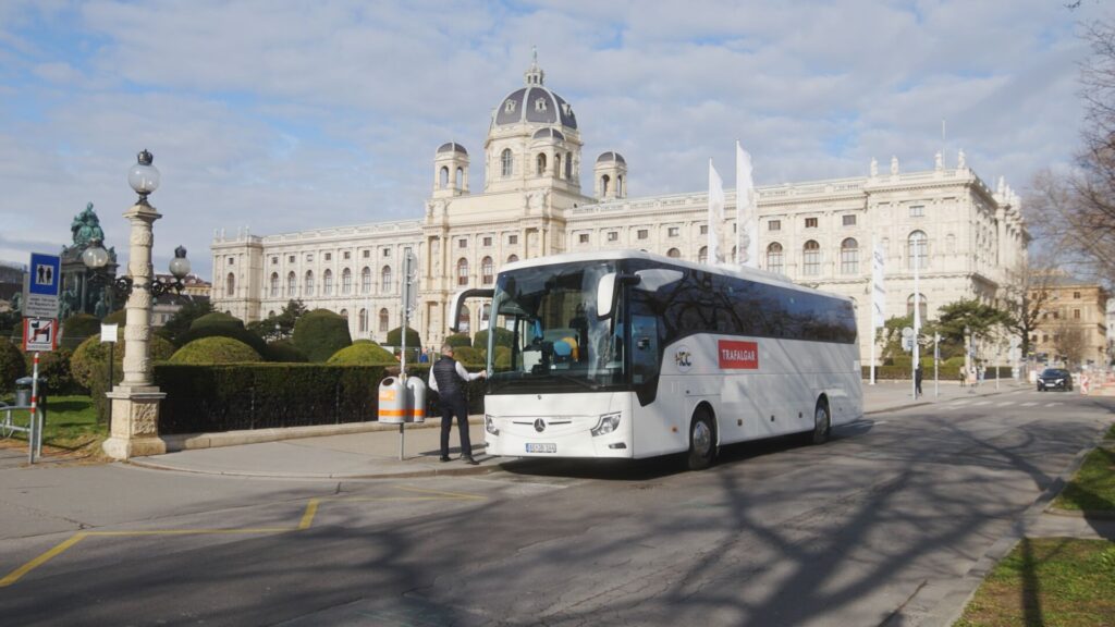 Coach driver getting into his coach