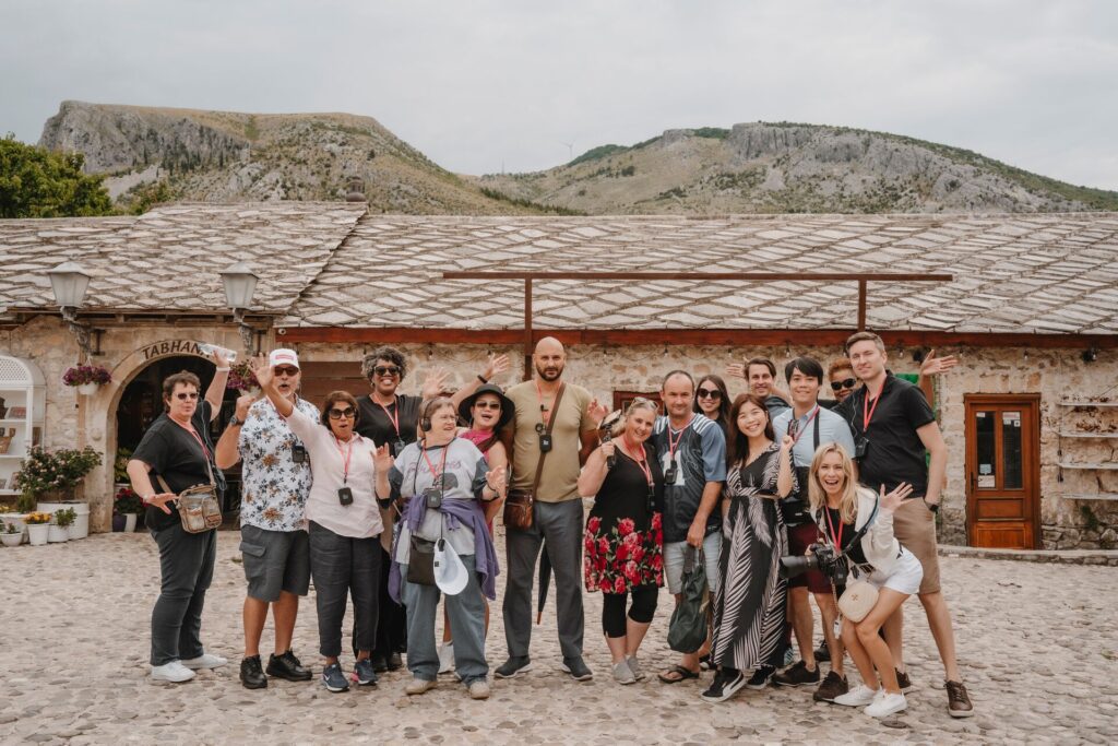 Travellers posing for photo on their Trafalgar group tour