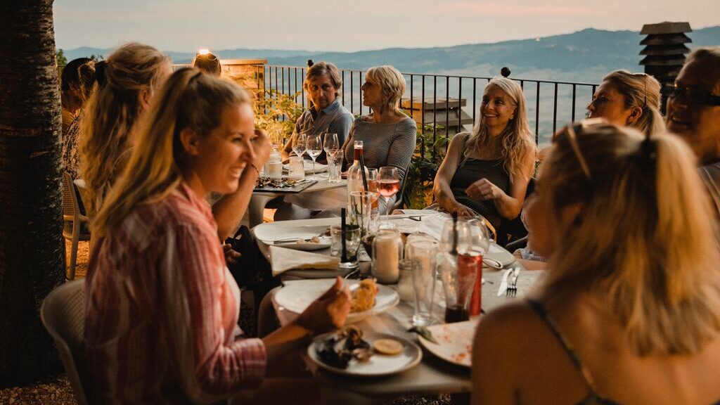 guests enjoying an italian meal together