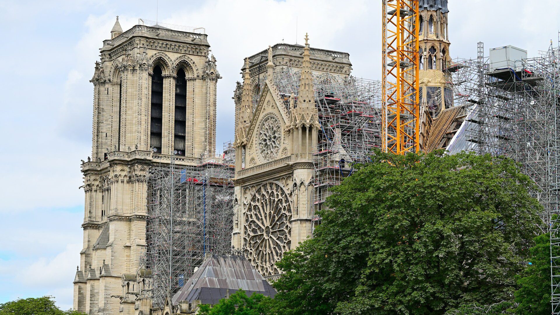 Close up view of Notre-Dae cathedral as the rebuilt spire is fixed into place