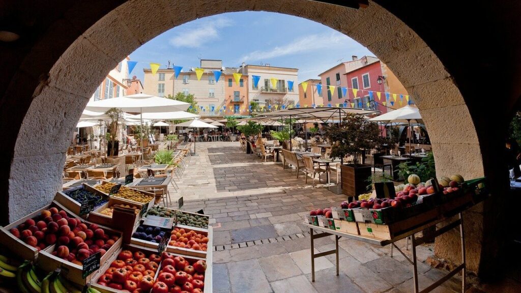 Explore France's famous archway adorned with an abundance of fresh fruit, featured in our travel guide.