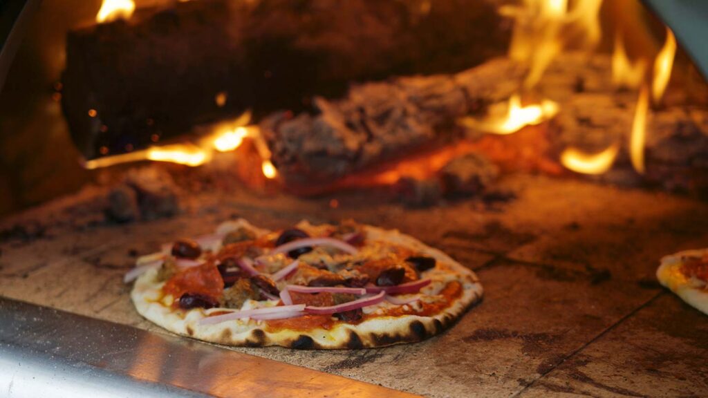 Pizza in a wood-fired oven
