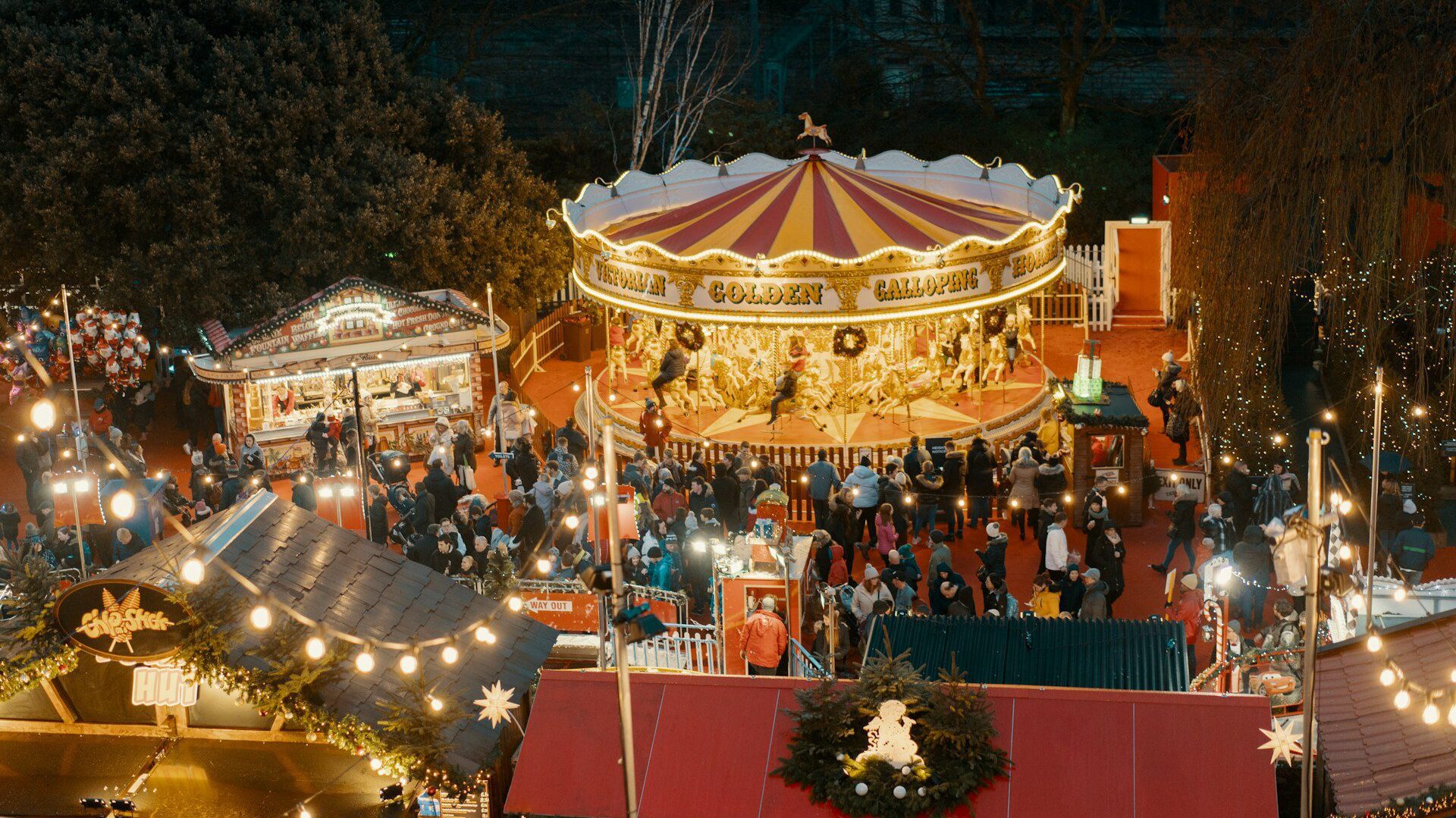 View looking down at Edinburgh's Christmas market in Princes Street Gardens
