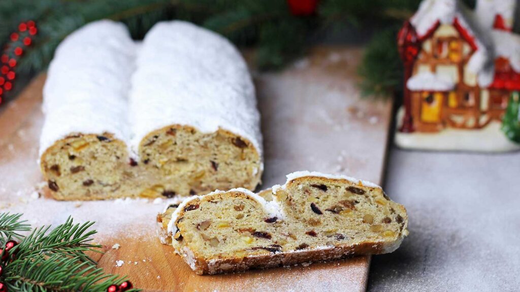Stollen, a rich fruitcake dusted with powdered sugar