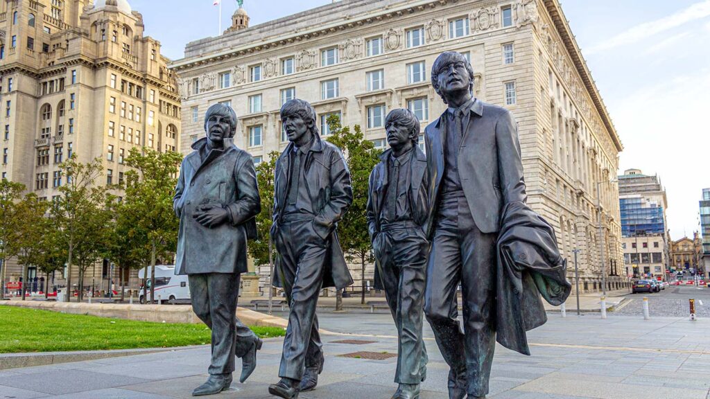 See The Beatles statue in Liverpool on a Trafalgar Tour