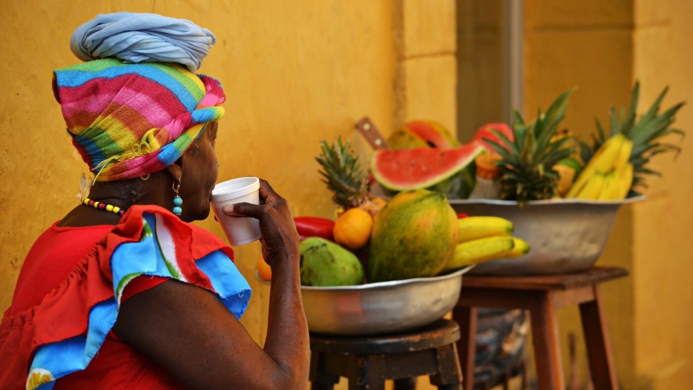 Woman drinking tea in Cartagena, Colombia