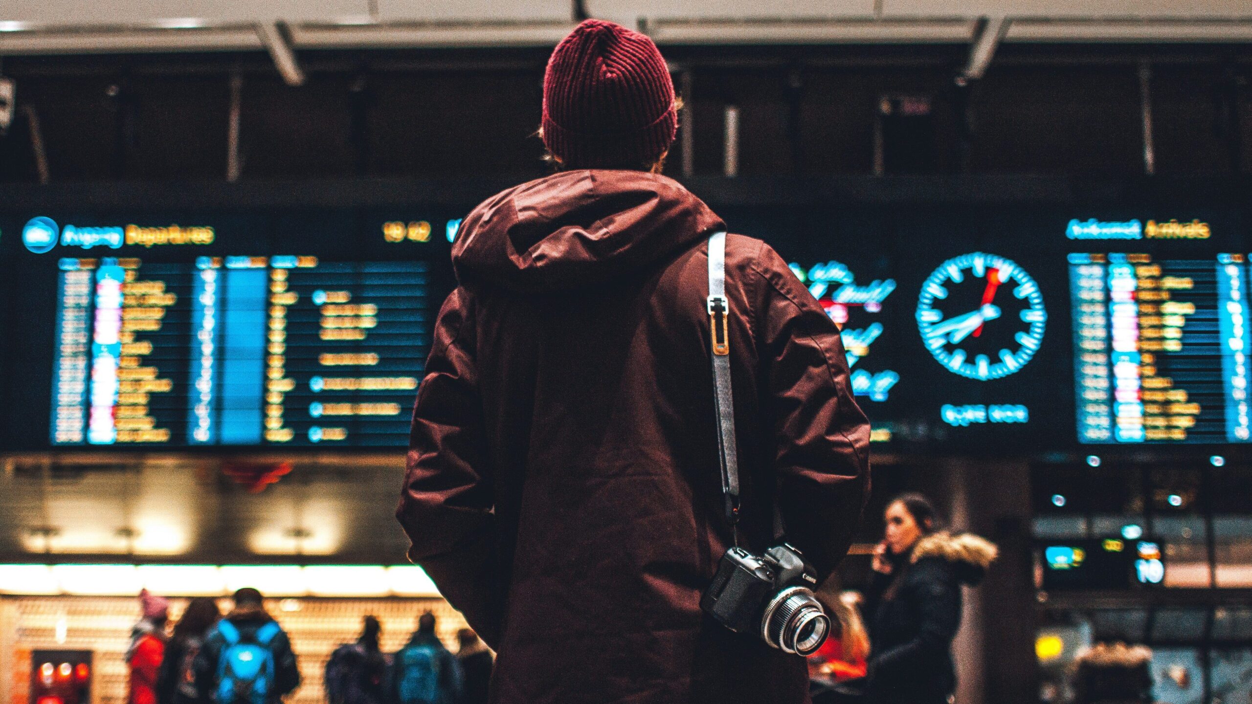 person with camera at the airport