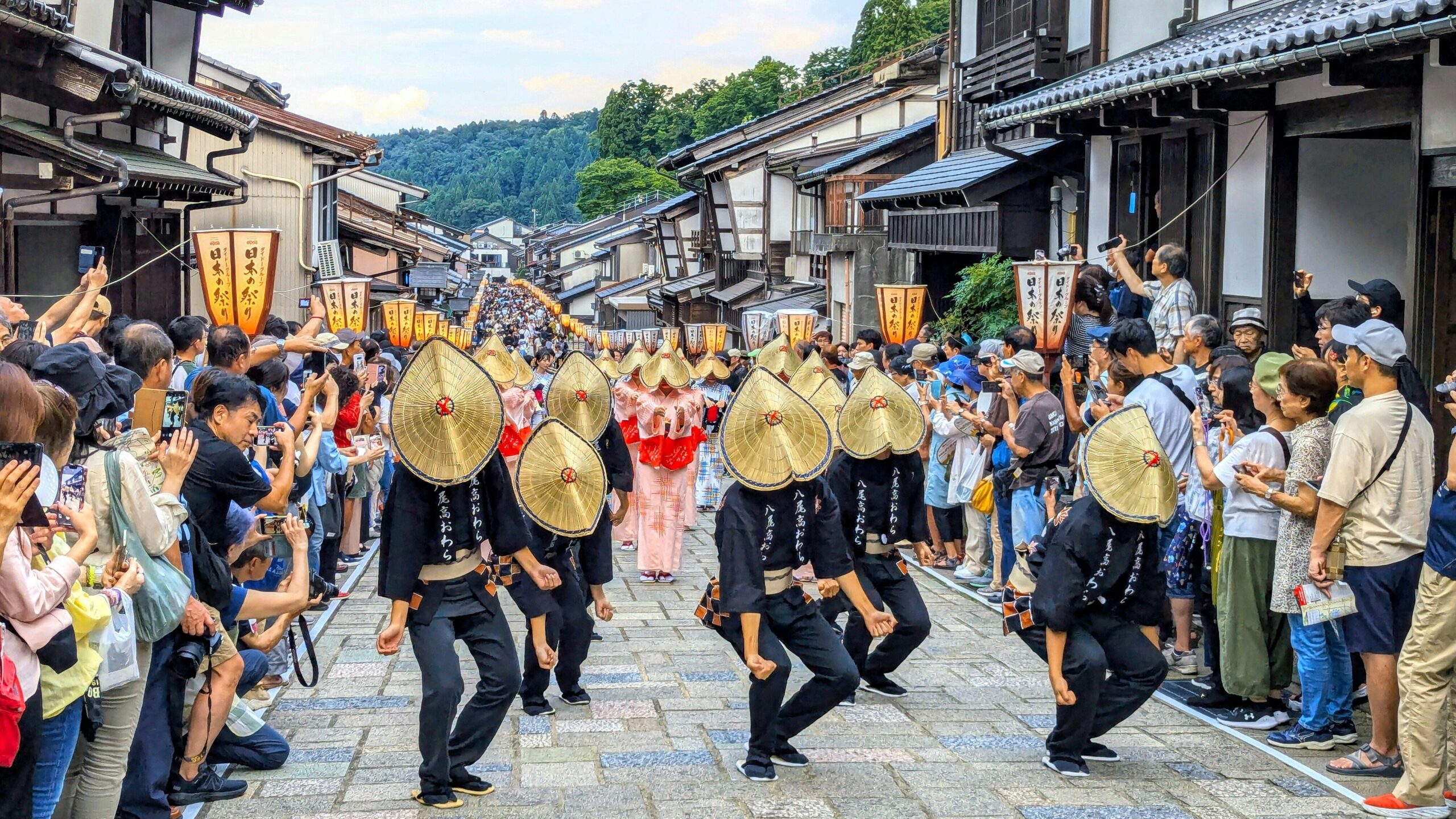 Owara Kaze no Bon dancers parade through Suwamachi Street for one of Japan's september events