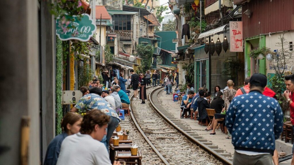 Train tracks passing through a street in Hanoi Vietnam