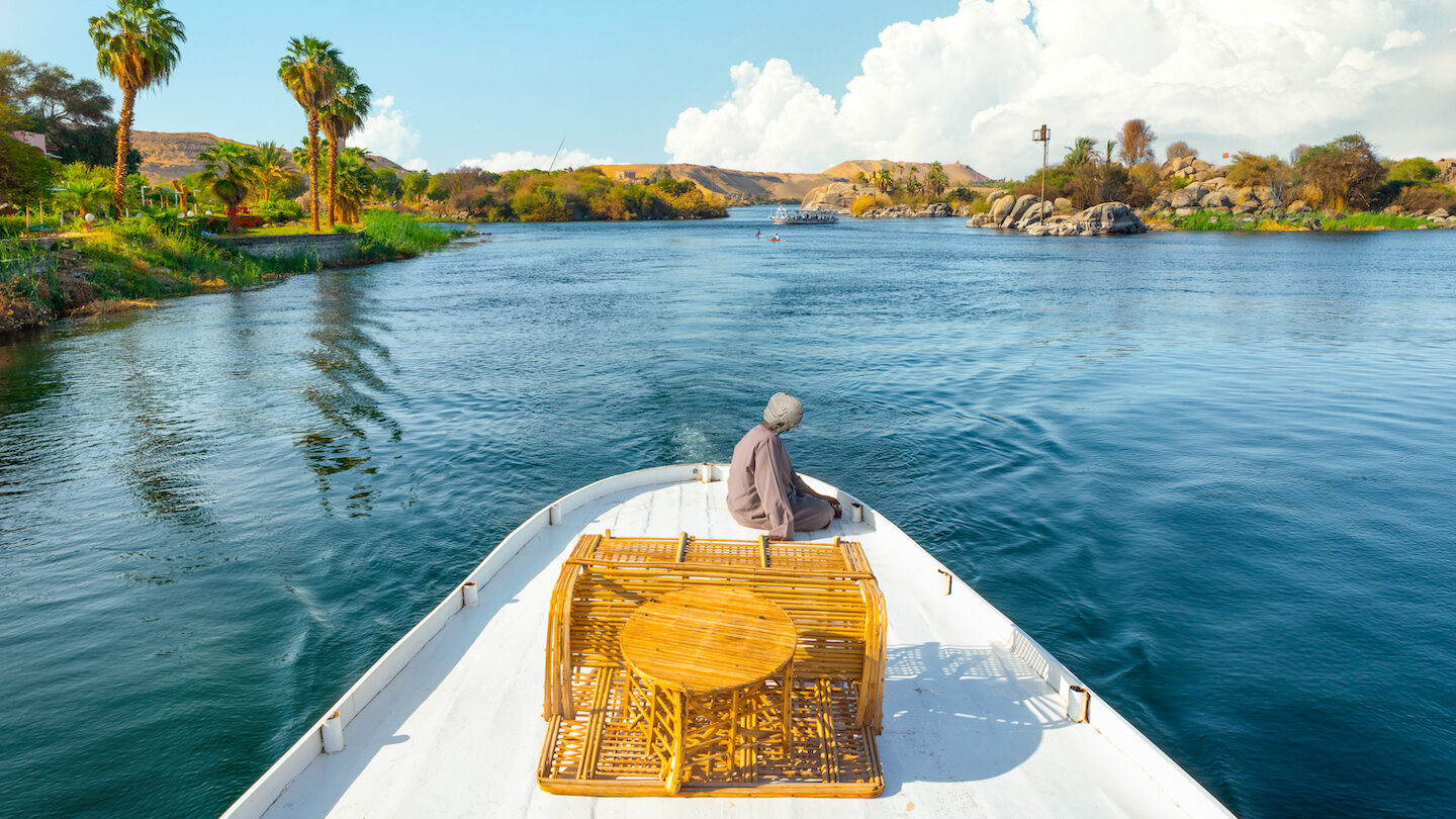 Man on the front of a boat on the River Nile