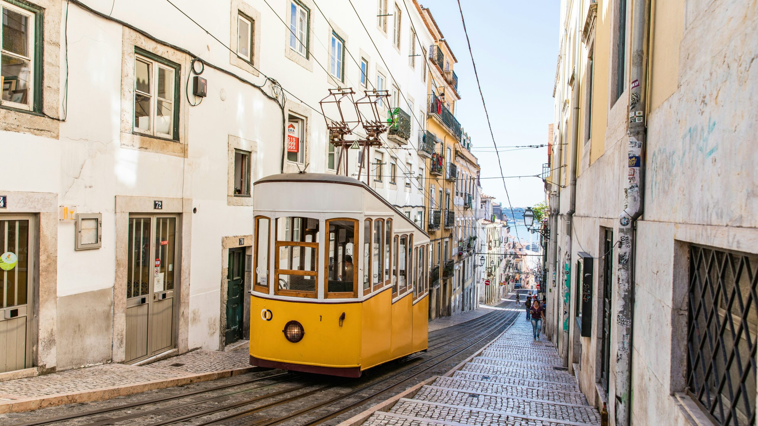 yellow tram on lisbon street