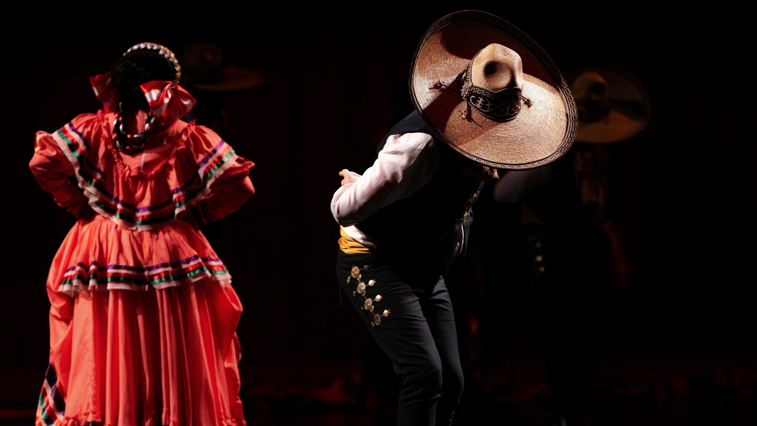 two flamenco dancers in shadow