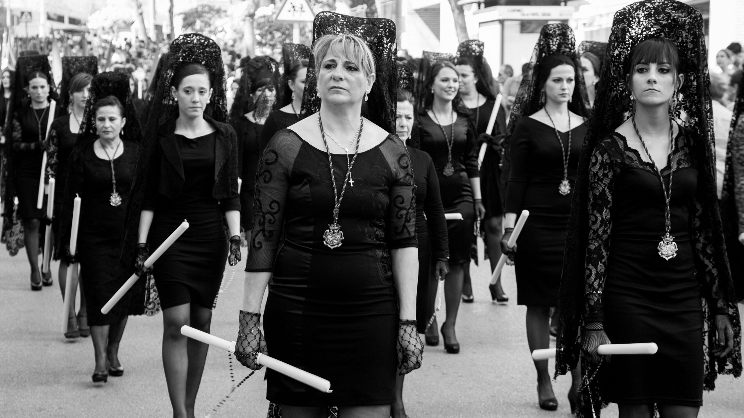 women dressed in black in parade for semana santa