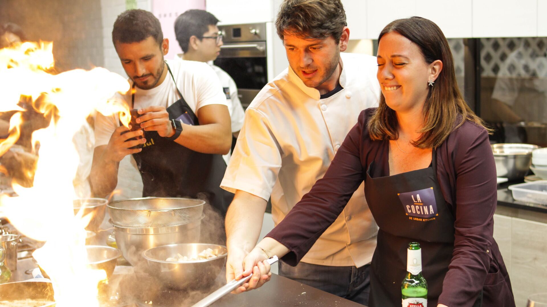 Chef and Be My Guest Host Ignacio instructs a cookery student