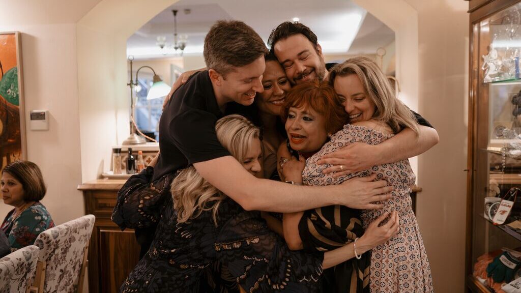 guests hugging on a trafalgar tour