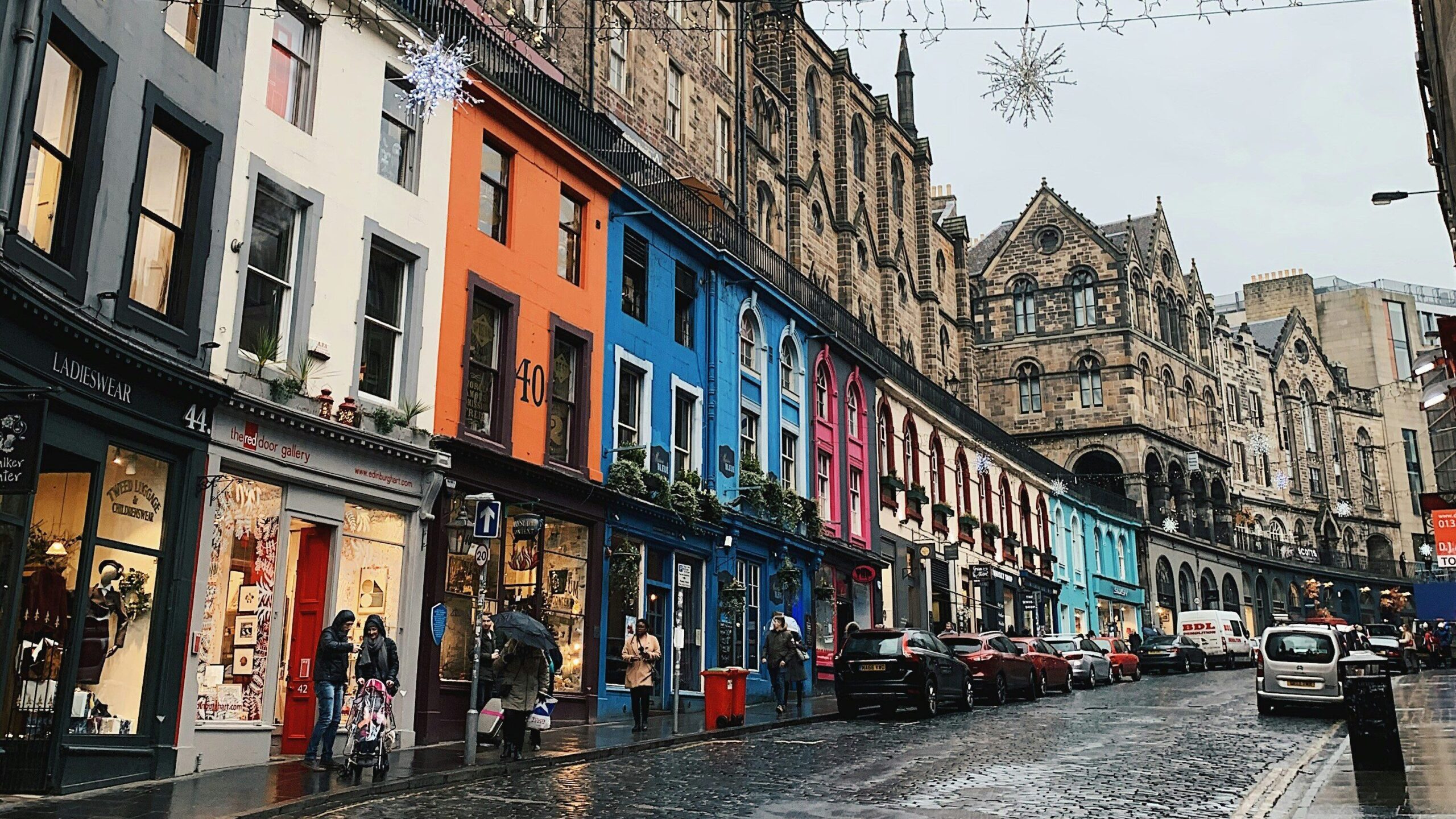 Colourful shops lining Victoria Street, Edinburgh.