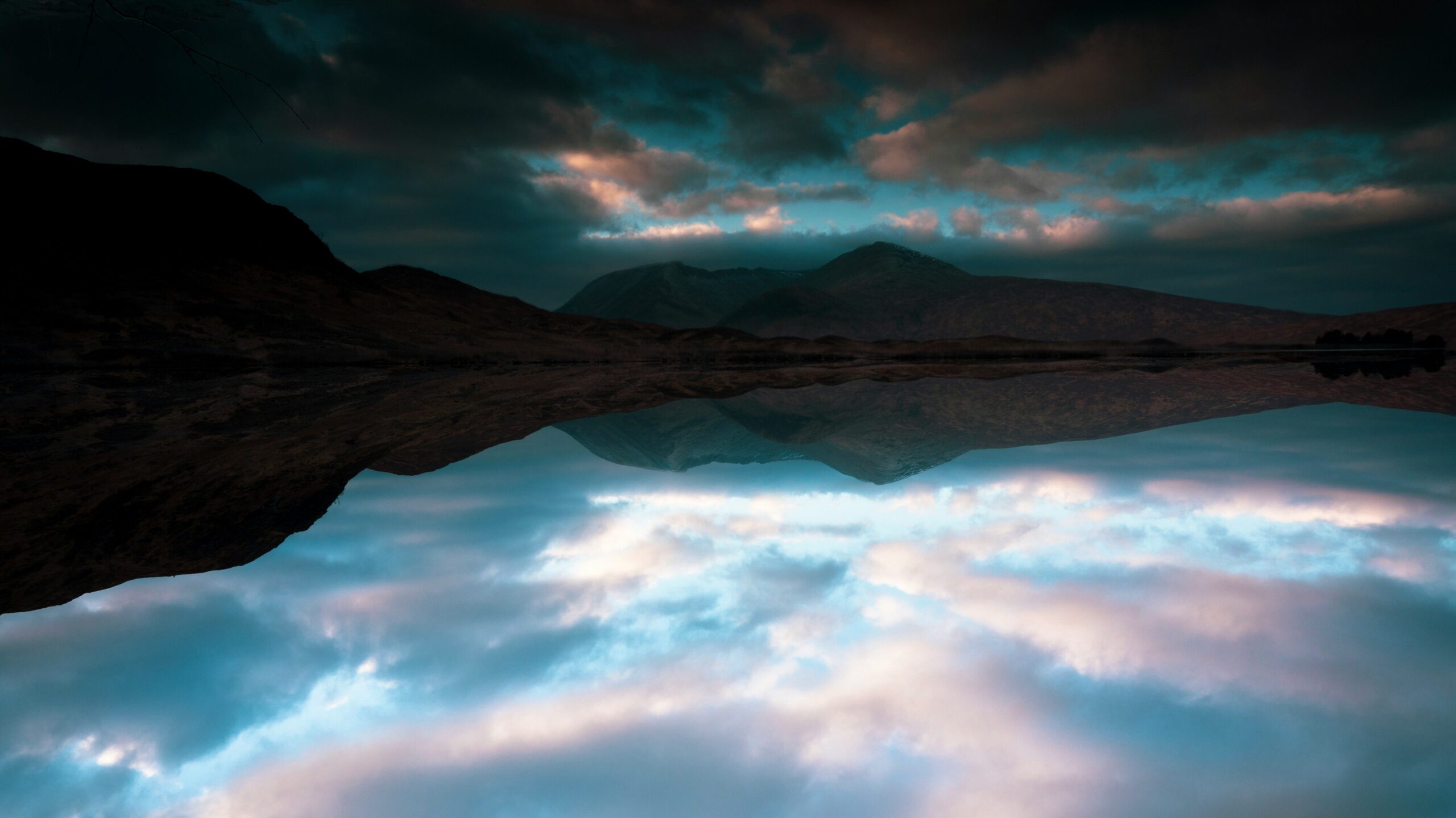 Reflection of the sky and hills in Lochaber, Scotland