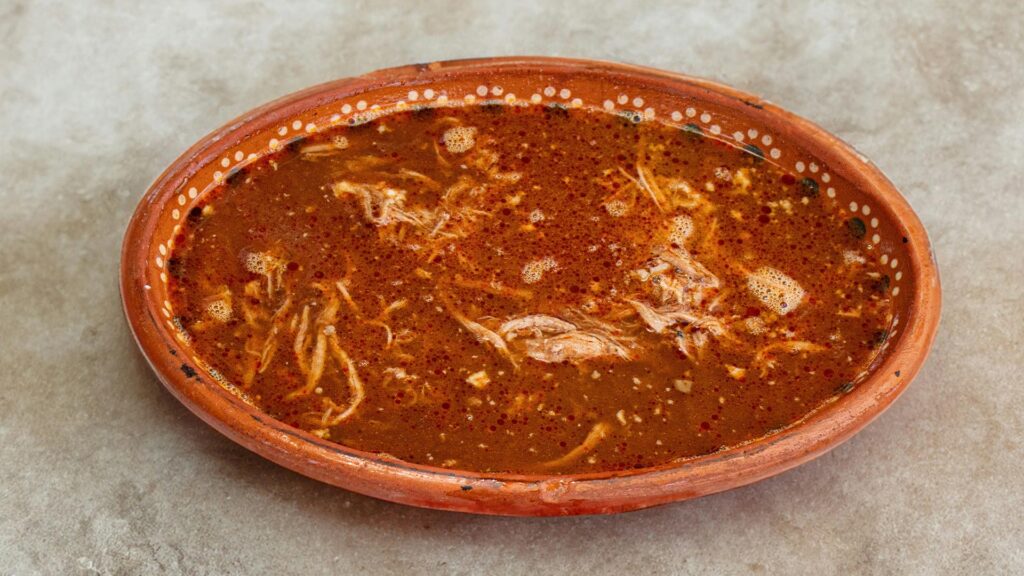 Bowl of Peruvian Sopa Criolla noodle soup with beef 