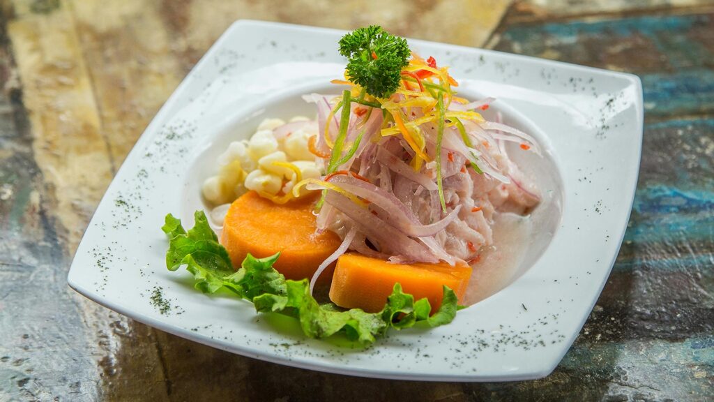 Ceviche: Freshly prepared Peruvian Ceviche with sweet potato and choclo corn.