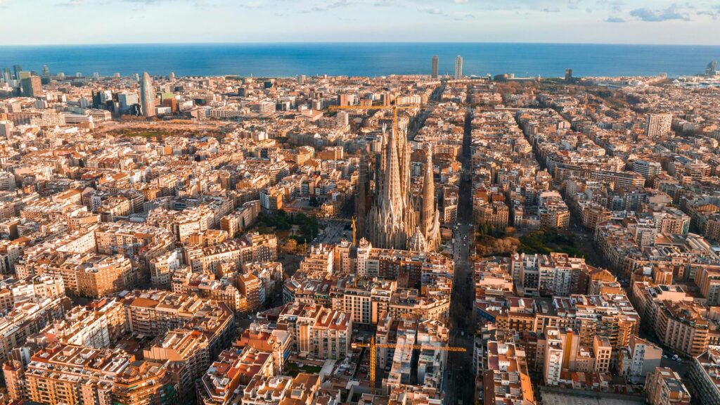 The Sagrada Familia as seen from above with Barcelona's famous grid streets
