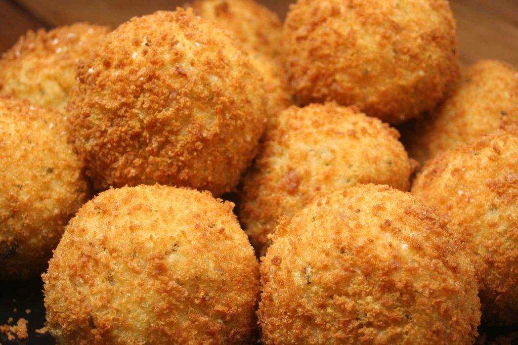 Half a dozen balls of golden Arancini