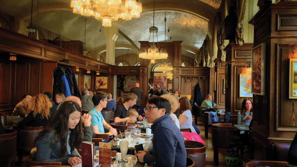 Interior of a Viennese coffee house with wood-panelled walls 