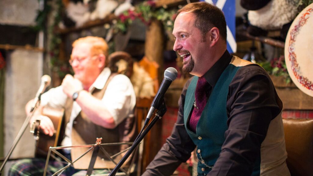 People in Scotland singing