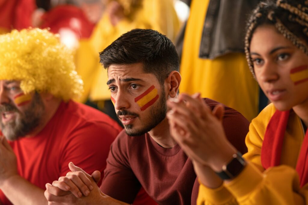 Spanish football fans with face paint