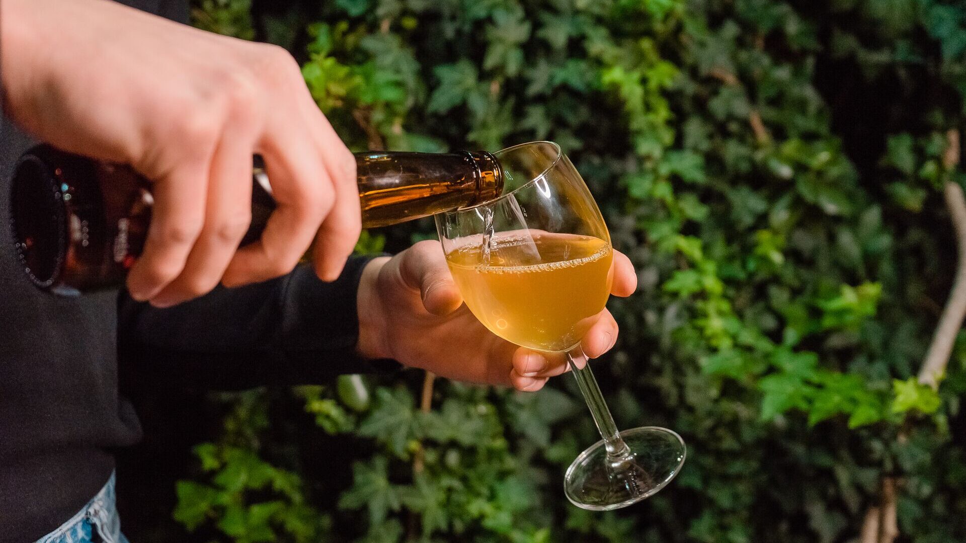  cider pouring into a glass