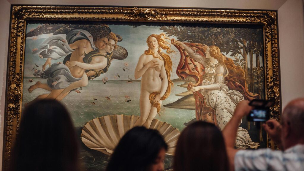 Tourists viewing the Birth of Venus by Botticelli at the Uffizi Gallery 