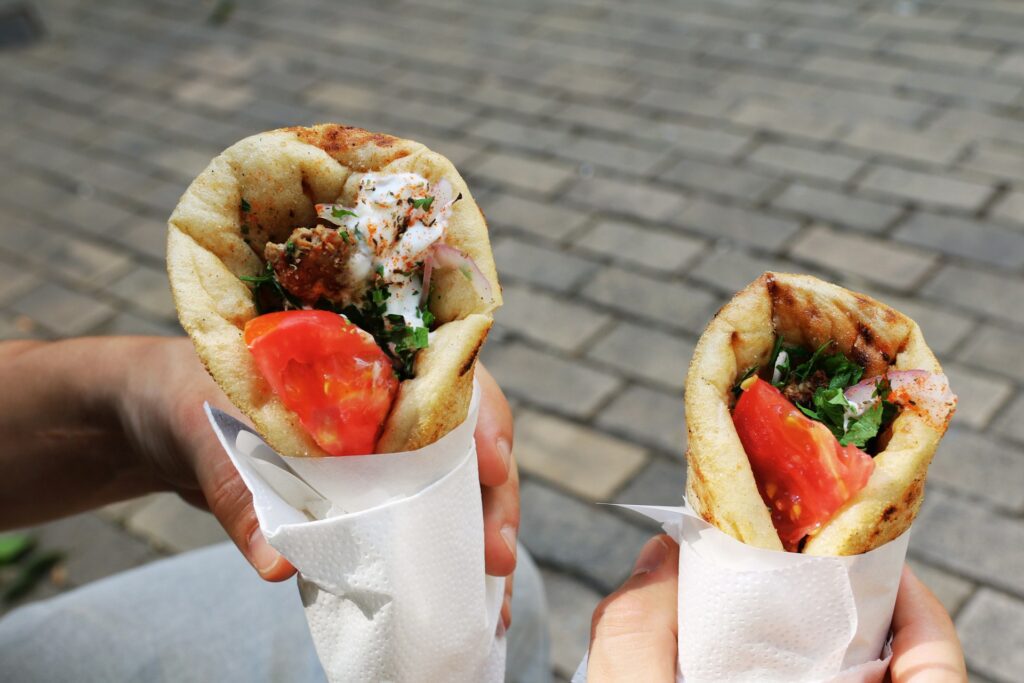 Close up of two classic Greek pitta kebabs